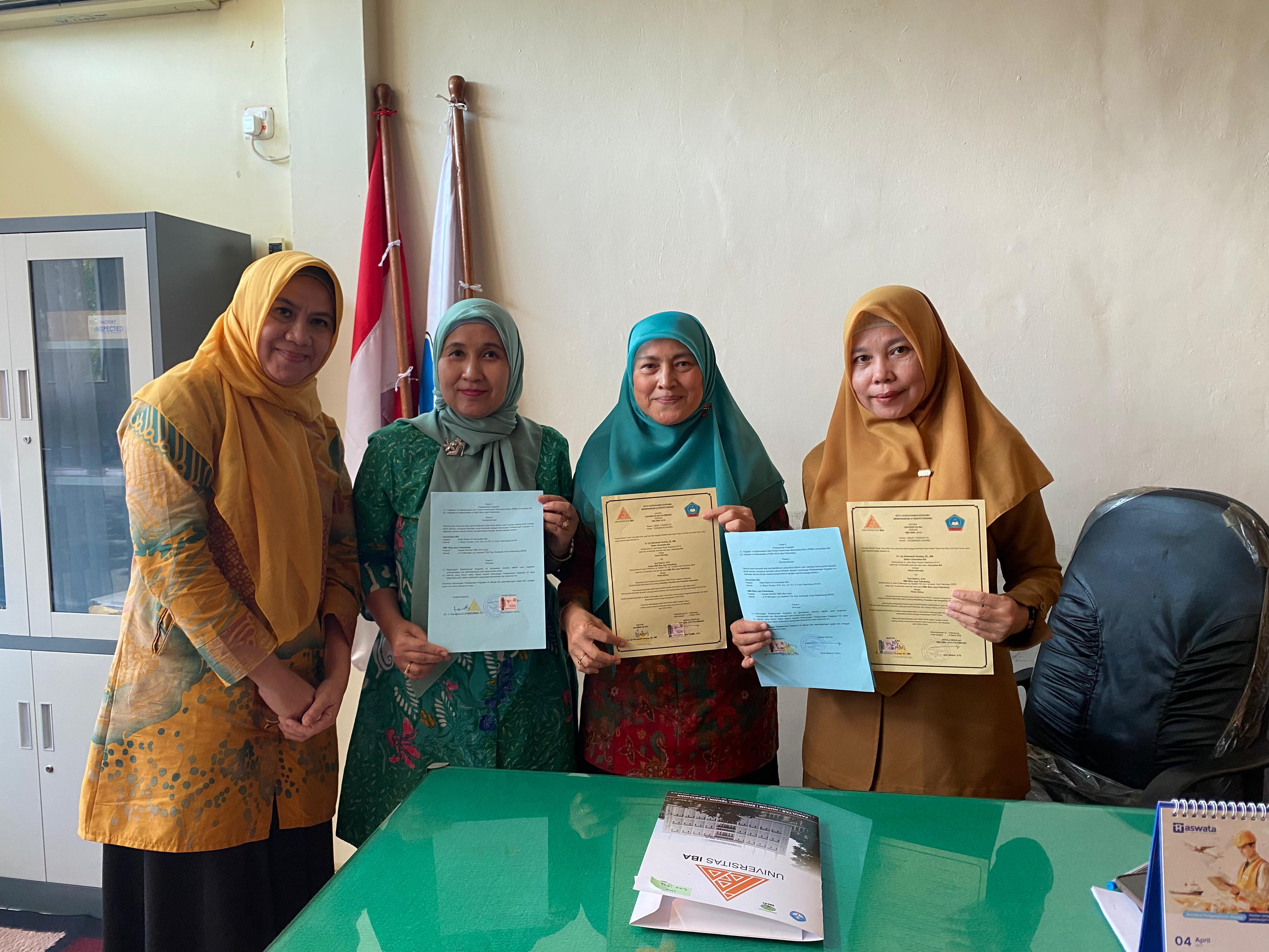 Penandatanganan MoU dan IA Universitas IBA dengan SMK dan SMA Bina Jaya Pagi Tadi Berjalan Lancar